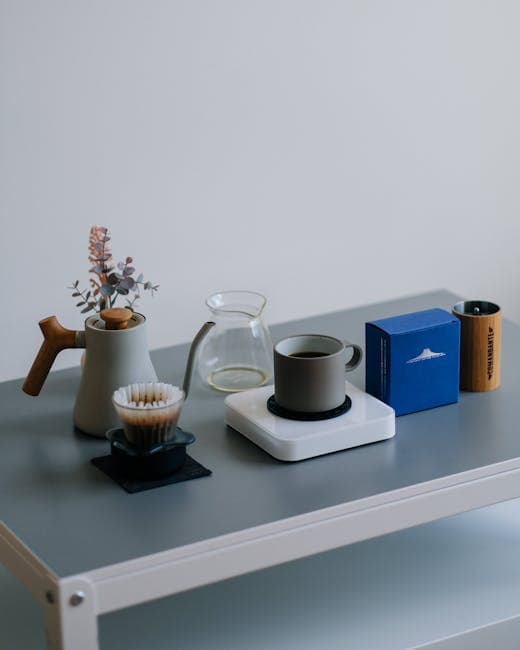 Cup of brewed coffee on table