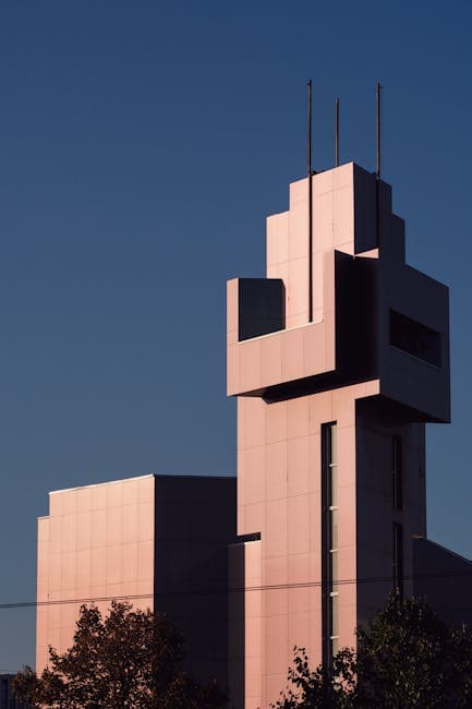 A tall building with a clock tower on top