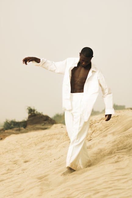 Man Wearing a Gown on a Desert 