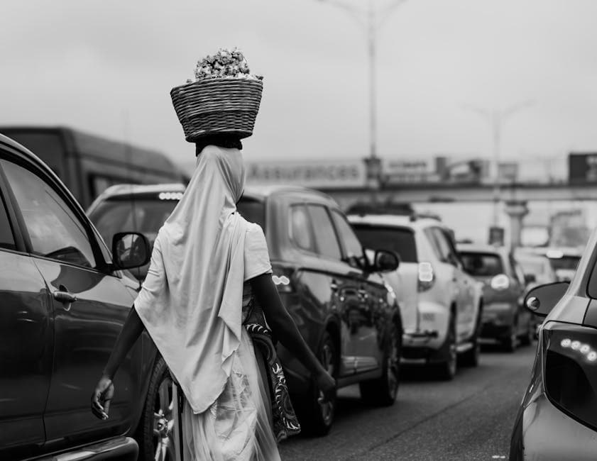 Woman Carrying Basket on Head