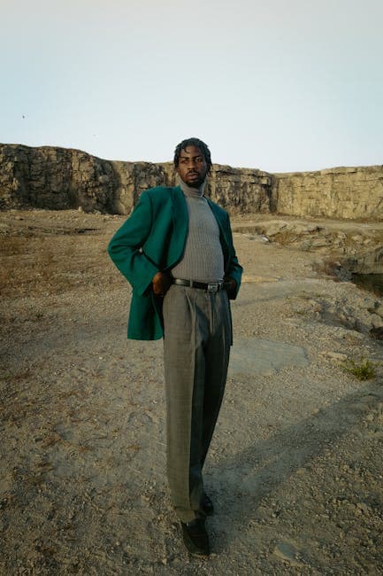 Man Standing in Green Jacket