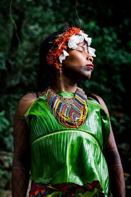 Photo of a Woman Wearing Traditional Clothing and Jewelry 