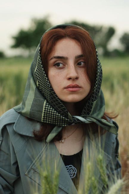 Portrait of Woman Wearing Headscarf Standing in Field