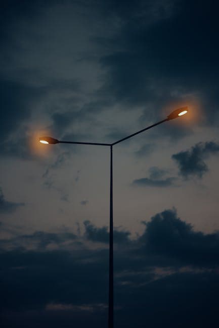 A Streetlight under a Cloudy Sky 