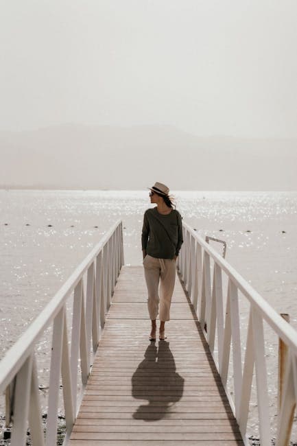 Woman in Hat on Pier