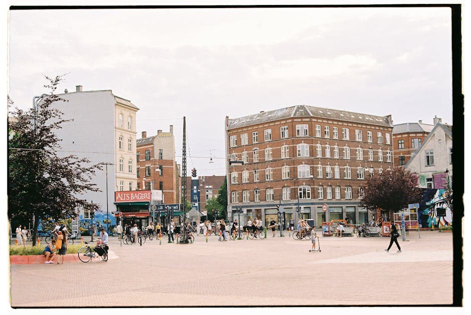 Pedestrians on Square in City