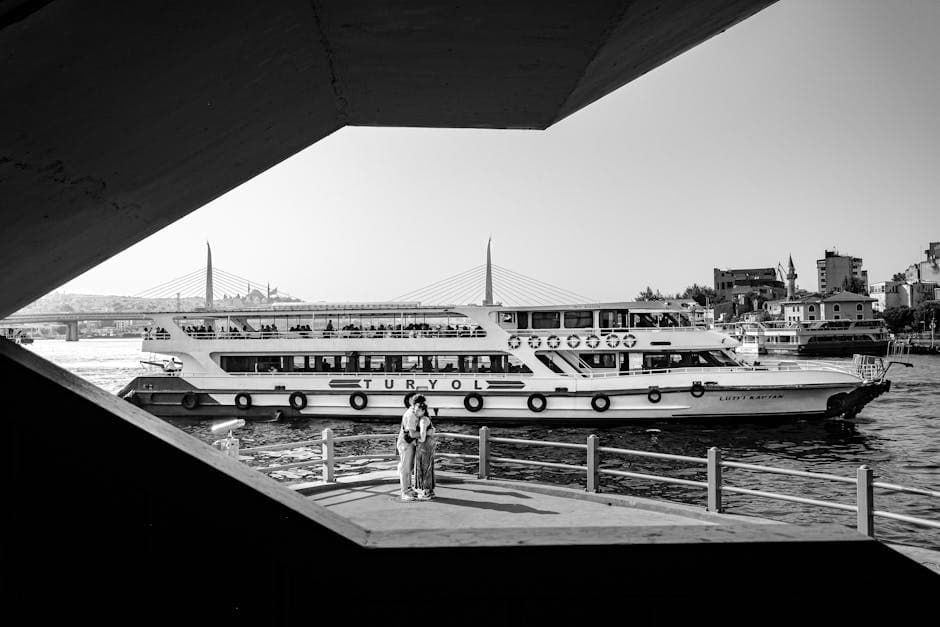 couple embracing on bridge