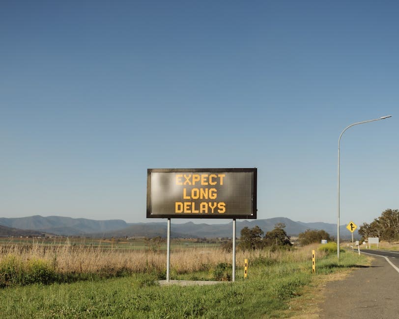 Expect Long Delays Sign by Road