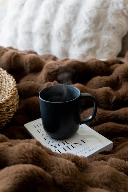 Cozy Coffee Break with Book and Blanket