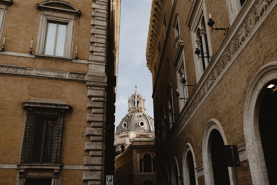 Beautiful Buildings in a Town by an Alley Leading to an Ornate Cathedral