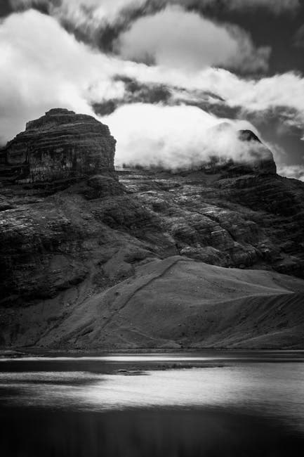 Barren Rocky Mountain by the Lake