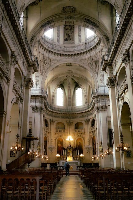 The interior of a cathedral with a large ceiling