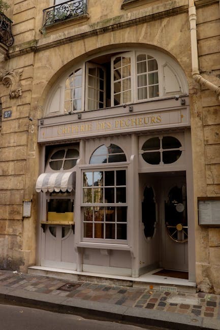 A restaurant with a large window and a door