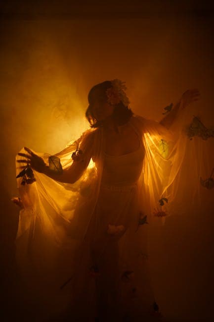 Woman with Tulle in front of the Orange Light