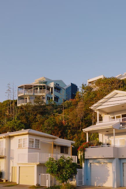 View of Houses on a Hill Illuminated by the Golden Sunset Light 