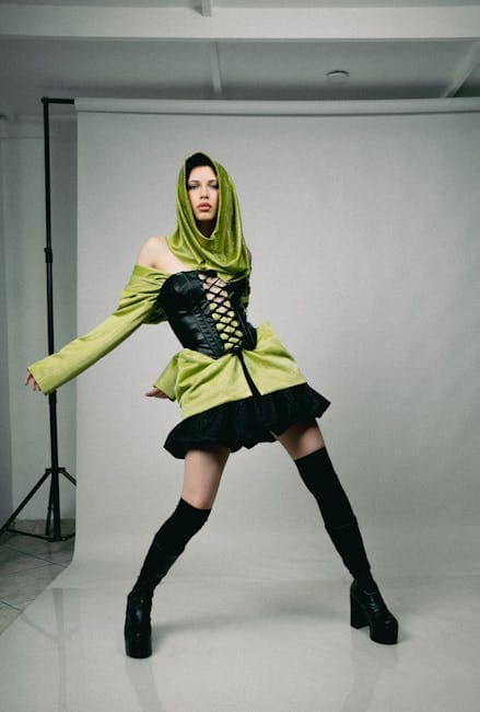 Model in Green Headscarf and Corset Posing in Studio