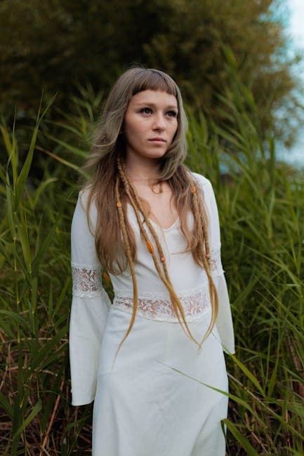 Woman in White Dress in Lush Outdoor Setting