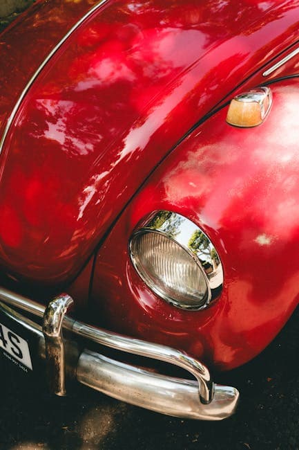 Vintage Red Volkswagen Beetle with Shiny Chrome