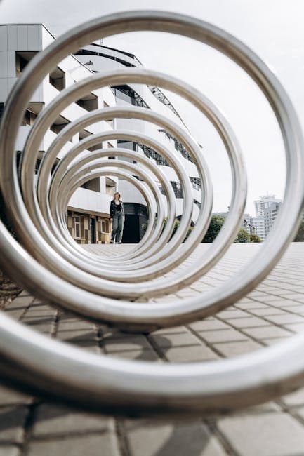 Architectural Spiral Art with Urban Backdrop