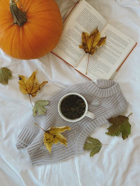 Cozy Autumn Flat Lay with Tea and Pumpkin