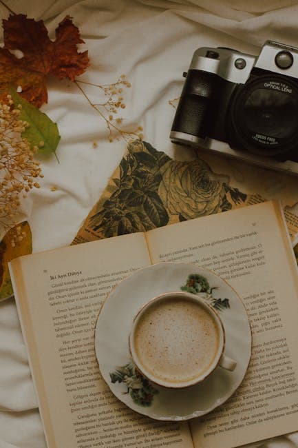 Cozy Autumn Setup with Camera and Coffee