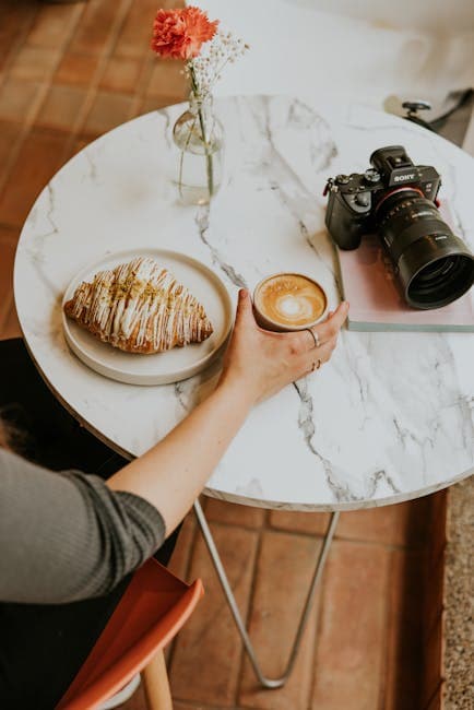 Cozy Café Scene with Coffee and Croissant