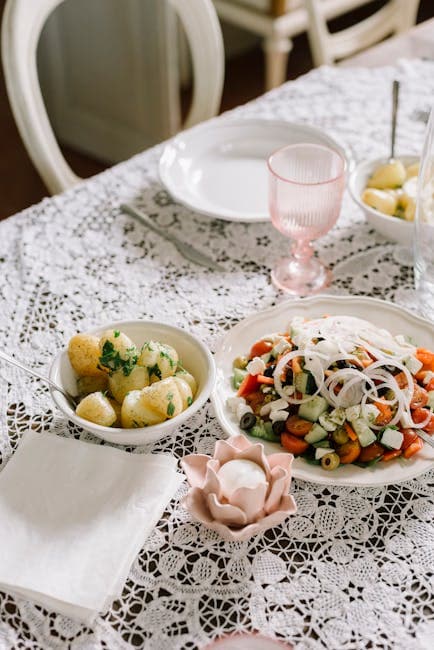 Spring Luncheon Table with Fresh Salad and Potatoes