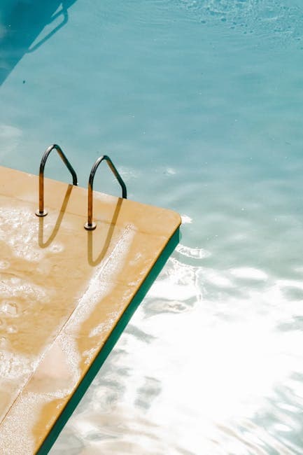 Sunny poolside with shimmering water