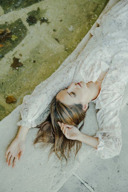 Young Woman Relaxing in Sunlight Outdoors