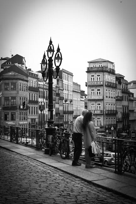 Romantic Couple Embracing in Cityscape